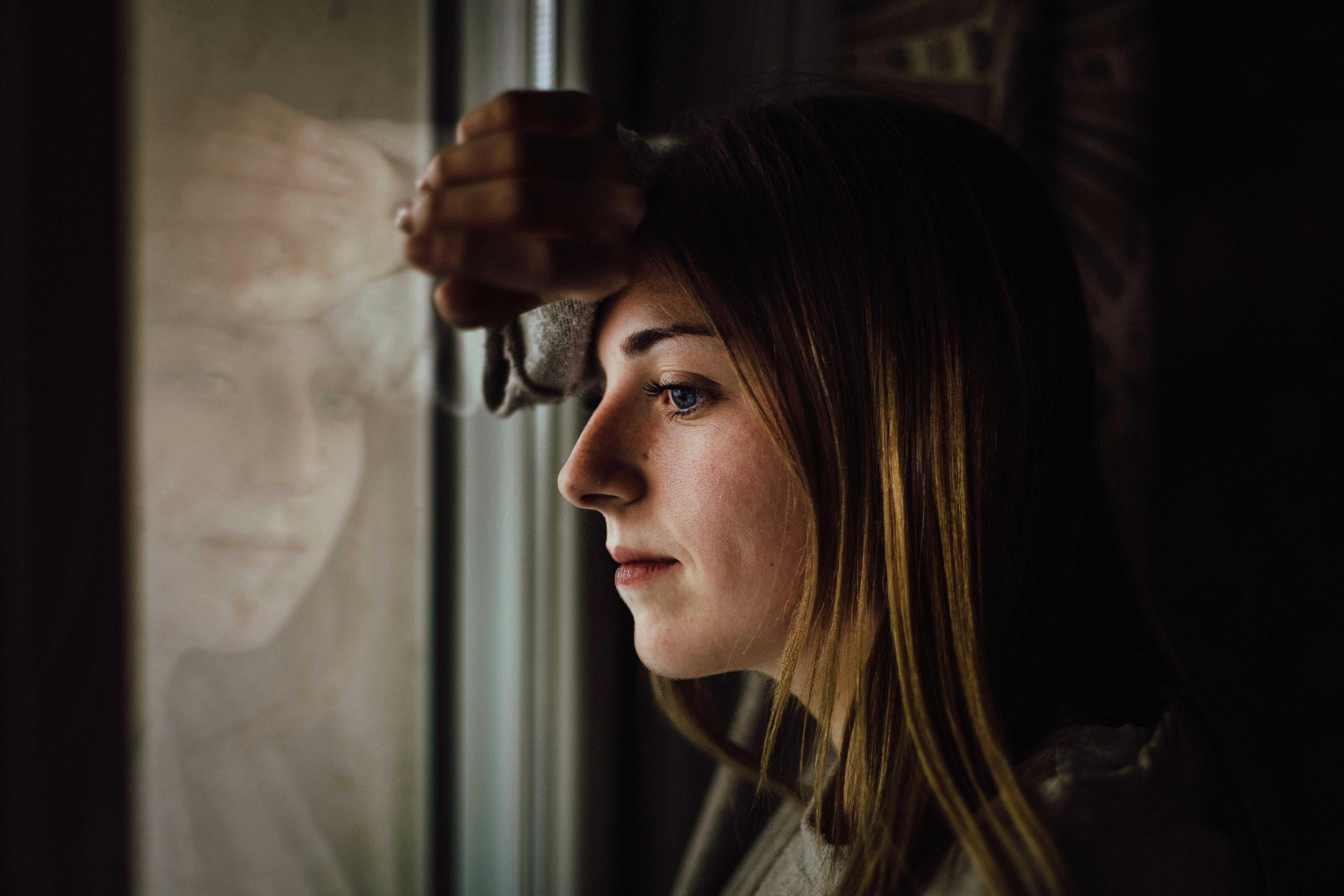 A woman contemplating her actions | Source: Pexels