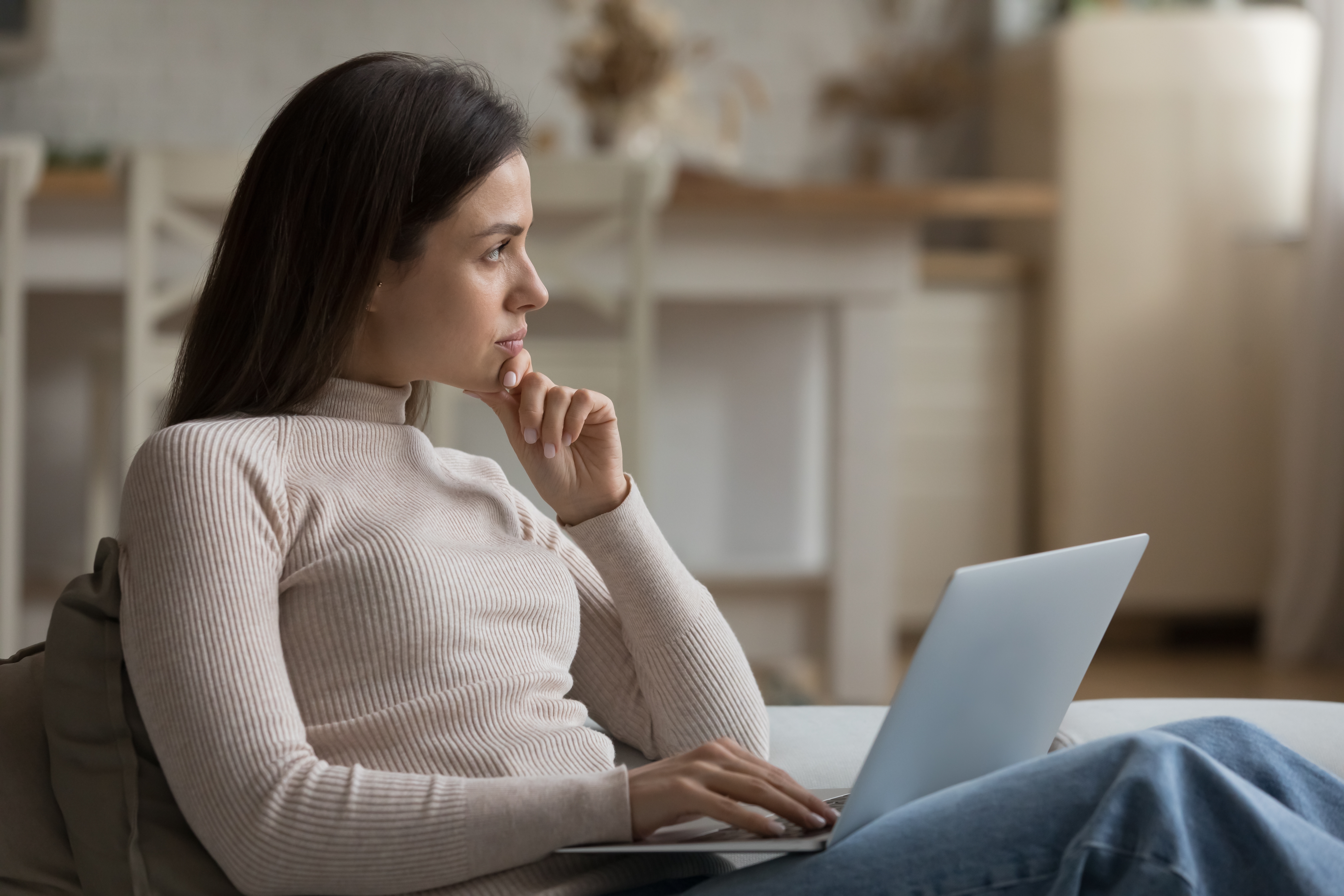 A woman lost in deep thoughts | Source: Shutterstock