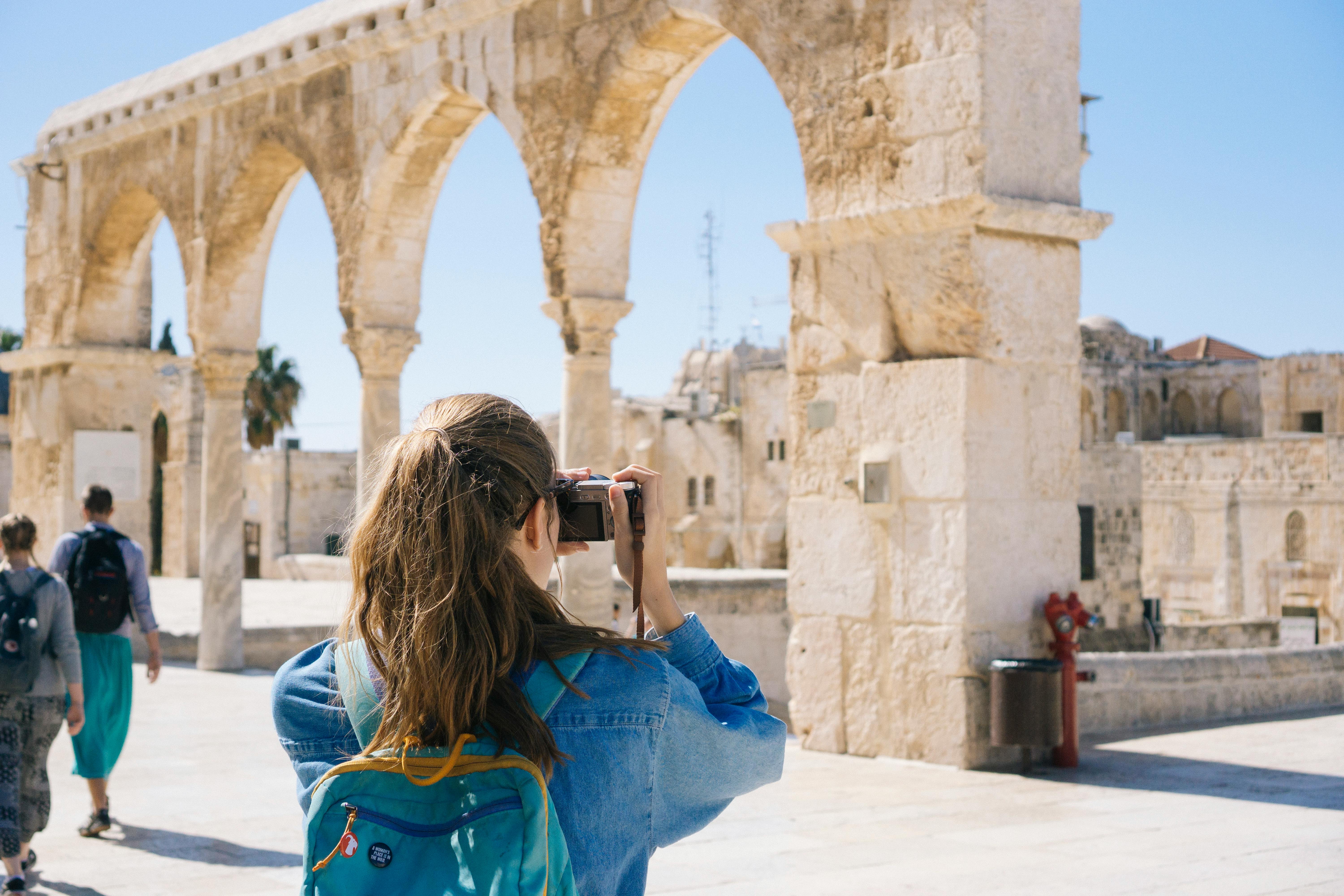 A tourist taking photos | Source: Pexels