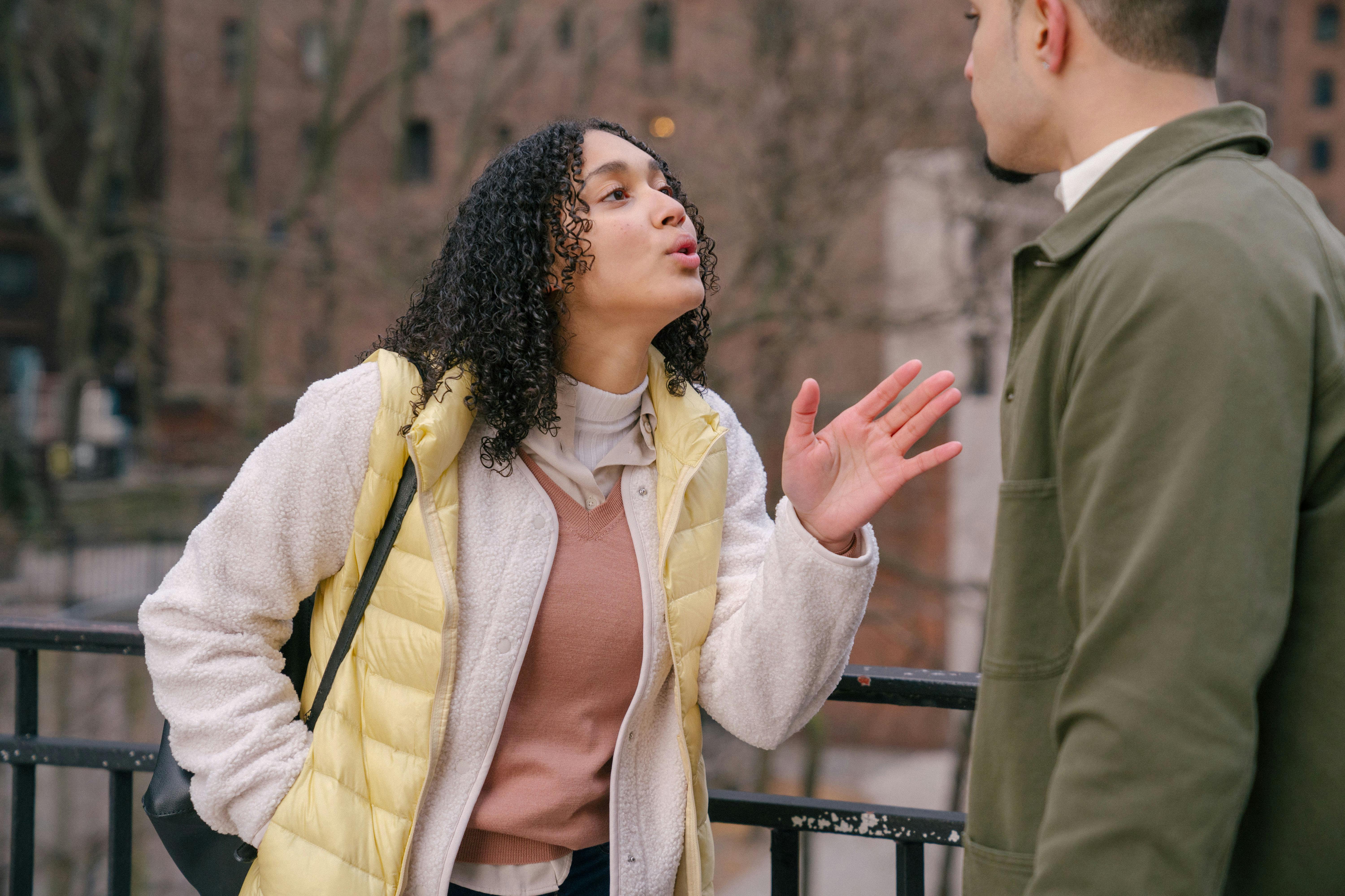 A girlfriend arguing with her boyfriend | Source: Pexels