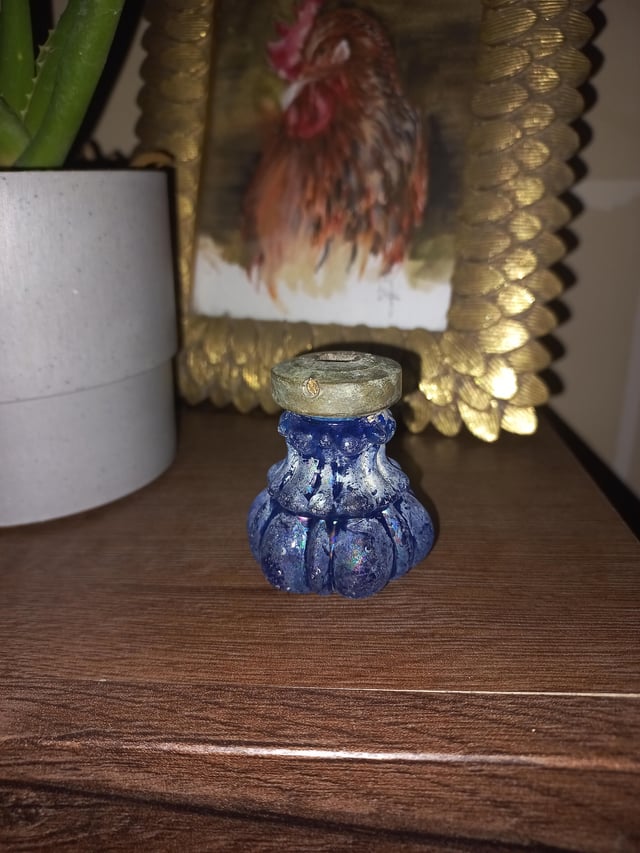 r/whatisthisthing - Found this piece in rubbles of an old house. It's made of glass and fairly heavy. Bottom flat. Top made of metal with a square hole