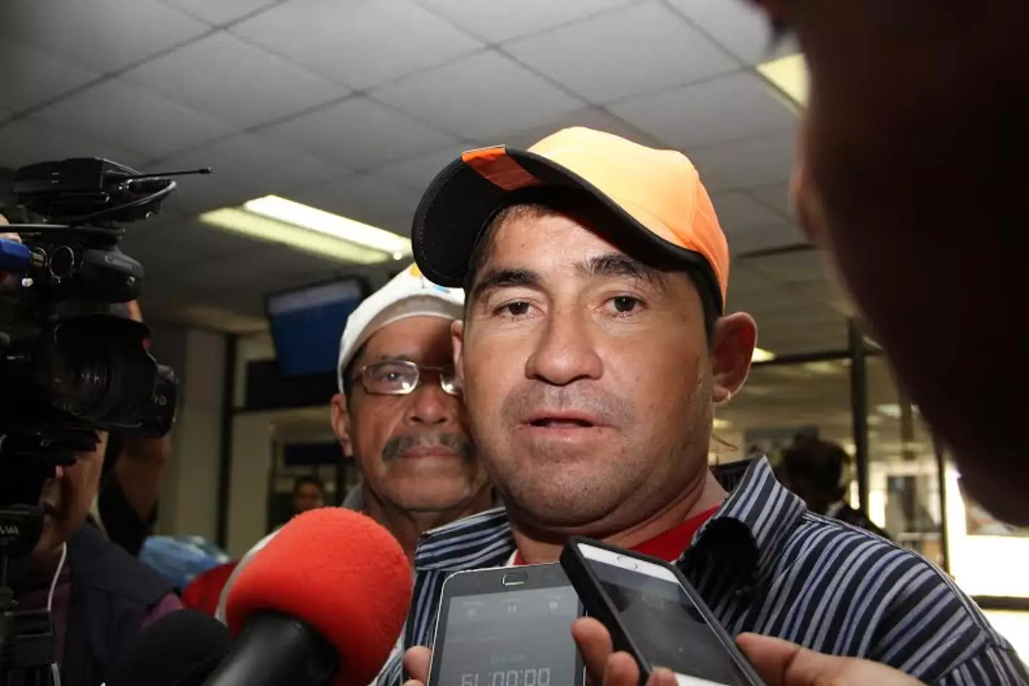 Alvarenga was flocked by reporters after returning. (ELIZABETH RUIZ/AFP via Getty Images)