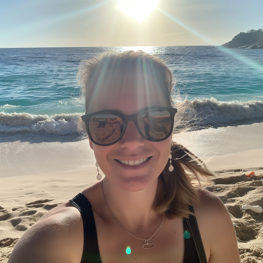 A woman taking a selfie on a beach | Source: Midjourney