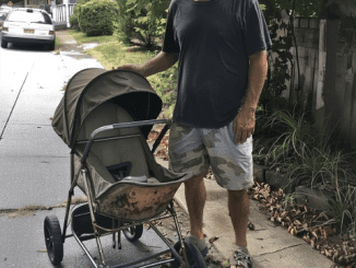 Poor Widowed Dad Buys Old Stroller at Flea Market, Hears Crackling Sound as He Puts Baby in It — Story of the Day