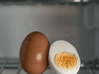 True or False: Hard-boiled eggs should be peeled before storing in the fridge.